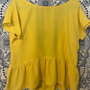 yellow open back shirt